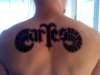 Aries tattoo on back tattoo