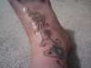 flowers on foot tattoo