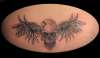 wings skull tattoo