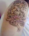 girlie koi with pink lotus flower tattoo