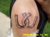 hourse shoes with initials in it tattoo
