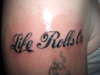i did this on my buddys arm (life rolls on tattoo
