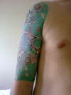 star and koi half sleeve tattoo