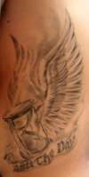 tat on my ribs by tom berg tattoo