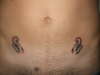 2x Scorpions on Stomach tattoo