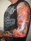 Black and Orange Dragon tattoo