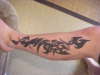 left feet tribal tattoo