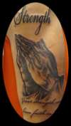 Praying hands tattoo