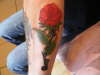 wifes name on rose tattoo