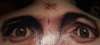 Charles Manson's eyes tattoo