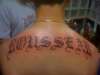 Last Name On Back tattoo