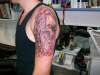 skulls and snake tattoo