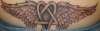 Heartagram with wings tattoo