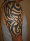 Tribal half sleeve tattoo