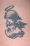 kneeling angel tattoo