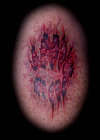 Zombie bite tattoo