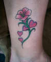 Lily and Hearts tattoo