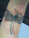 gradonfly on wrist tattoo