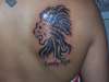 lion w/lettering tattoo
