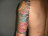 Red Flower back tattoo