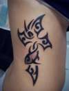 Tribal cross with fish tattoo