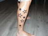 Stars on calf tattoo