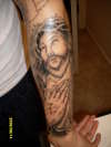 Jesus Face and prayin handz tattoo