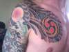 Japanese chest and arms tattoo