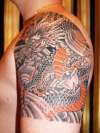 Japanese dragon quarter sleeve tattoo