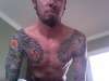 japanese chest and arms tattoo