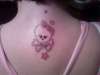 Skull And Crossbones With Pink Bow tattoo