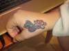 swallow at hand tattoo