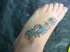 Stars and flowers tattoo