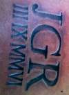 branded lettering tattoo