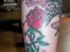 my rose tat a symbol of love done by my husband. tattoo