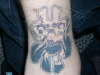 skull money tattoo