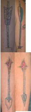 Arrow skin tear tattoo