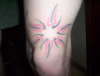 tribal sun tattoo