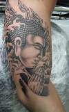 Praying Buddha tattoo