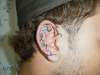 ear tribal tattoo