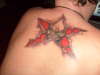 torn star skull tattoo