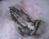 Praying tattoo