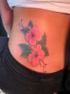 Side lillies tattoo