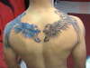 skull wings tattoo
