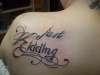 just kidding tattoo