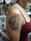 kokopelli  punk girl tattoo