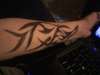 tribal forearm tattoo