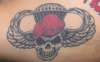 AIRBORNE with skull tattoo