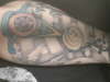 back of arm tattoo