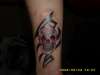 Skull n tribal tattoo